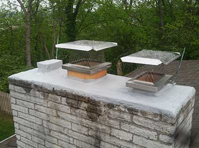 Remove Unwanted Winter Wildlife blog post photo at Barnes Wildlife Control: chimney caps