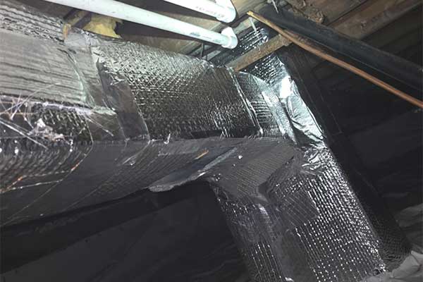 Raccoon Damages Sidney Ohio Crawlspace Blog photo: Ducts in crawlspace repaired