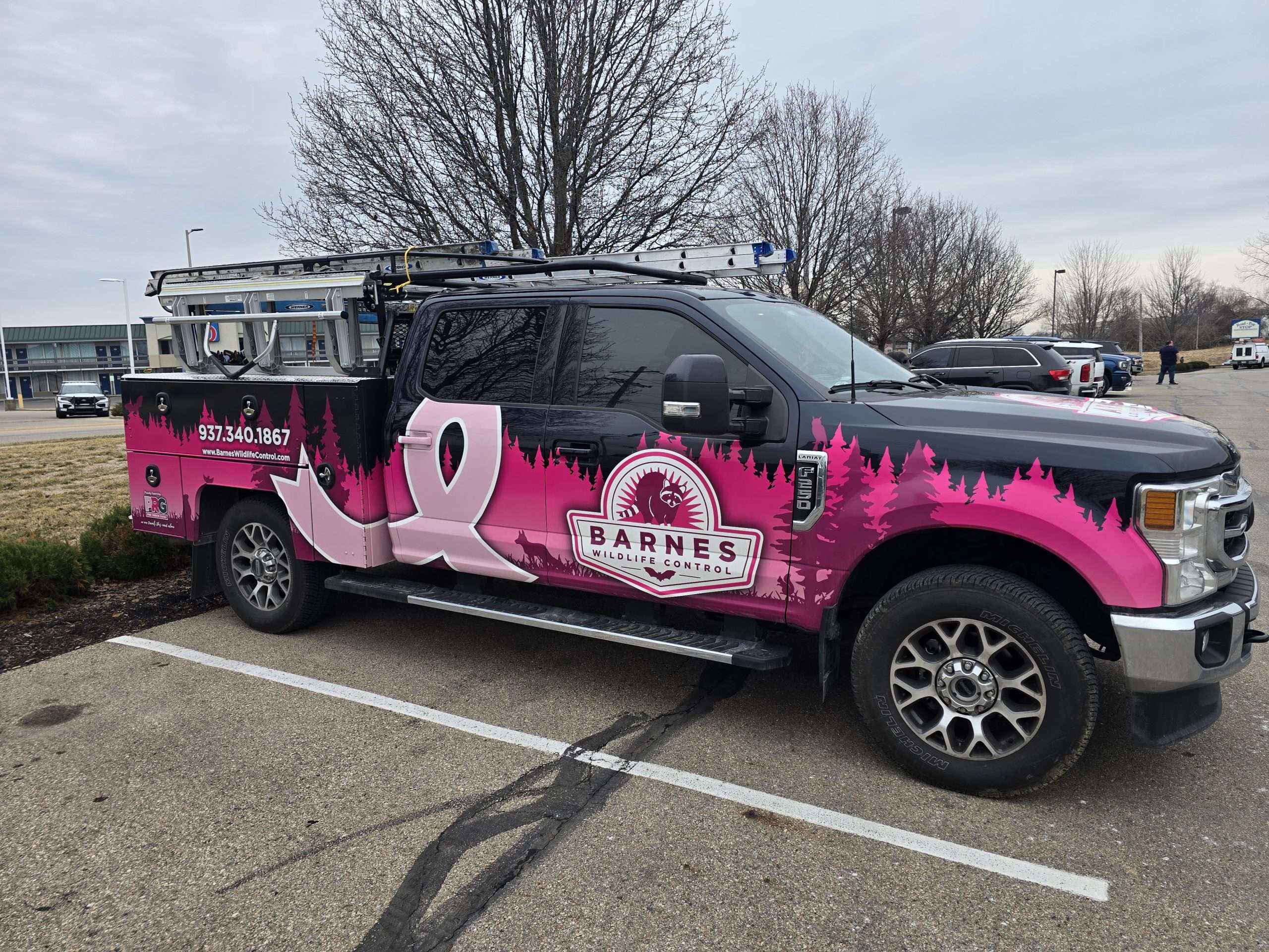 Power of Pink Wildlife Control truck