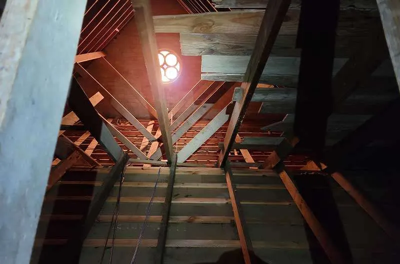 Greenville bat removal service page photo of a cleaned attic floor which was a horrible mess.