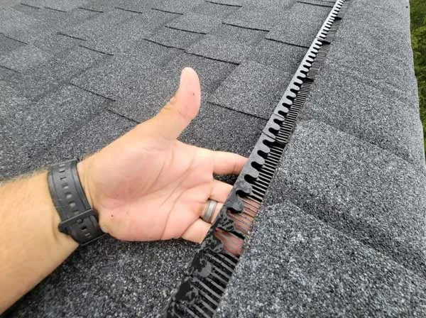 Centerville bat removal service page photo of a poor install of roof gap protector